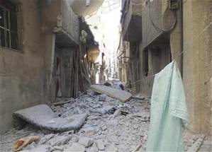 Edificios daados en al-Tadamon, en Damasco, en una foto entregada por la cadena de noticias Shaam. September 7, 2012. Foto: Shaam News Network. Esta foto se distribuye tal cual como fue recibida / Reuters
